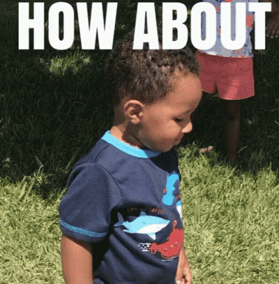 Little Boy In Blue Shirt With 3 In Grass GIF