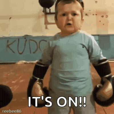 Little Boy In Boxing Gloves Says It's On GIF