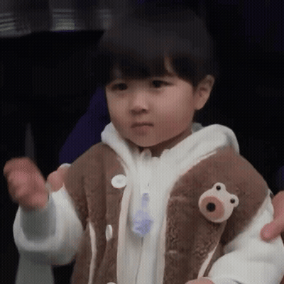 Little Boy In Brown Jacket With Teddy Bear GIF