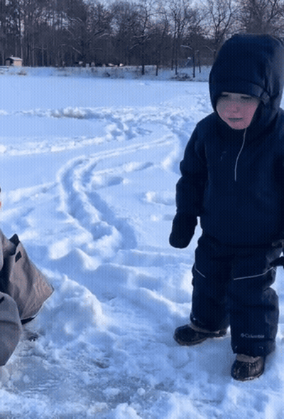 Little Boy In Columbia Jacket And Pants In Snow GIF