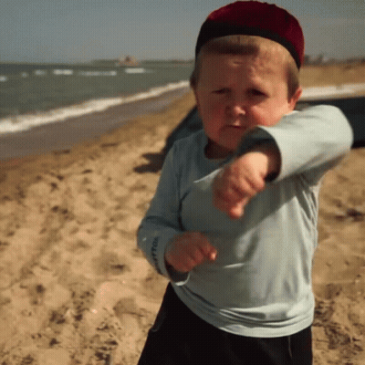 Little Boy In Hat Wearing Lotto Shirt GIF