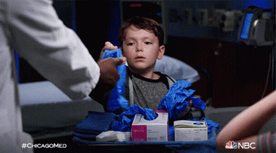 Little Boy In Hospital Bed With NBC Gloves Box GIF