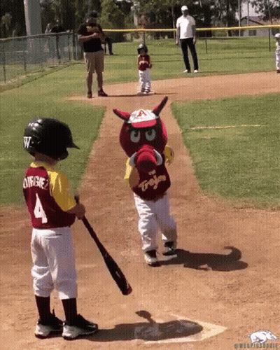 Little Boy In Jersey Number 4 Playing Baseball With Mascot GIF