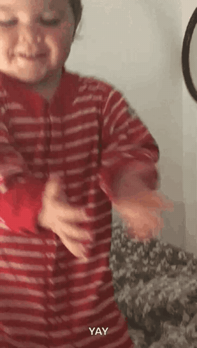 Little Boy In Red And White Striped Shirt Dancing Smiling GIF