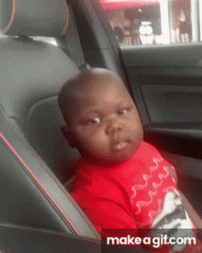 Little Boy In Red Shirt Sitting In Back Seat Of Car GIF