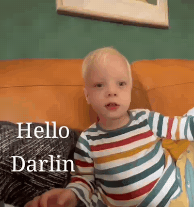 Little Boy In Striped Shirt Says Hello GIF