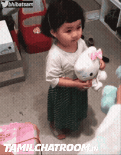 Little Boy Kneeling Holding Soap Dispenser GIF
