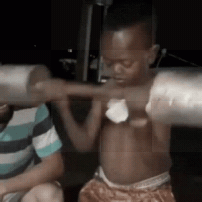 Little Boy Lifting Barbell Overhead GIF