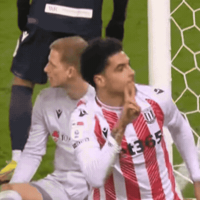 Little Boy Making Funny Face And Pointing GIF