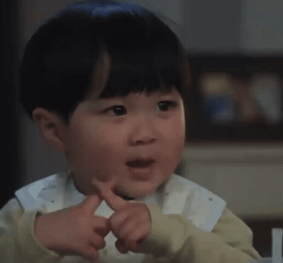 Little Boy Making Funny Face Pointing GIF