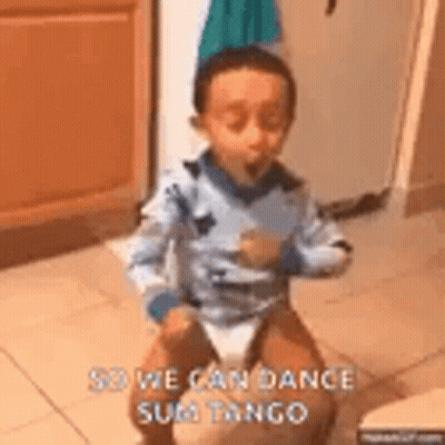 Little Boy Sitting On Lap And Dancing GIF
