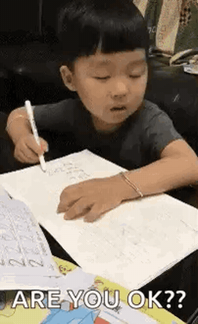 Little Boy Writing In Notebook GIF