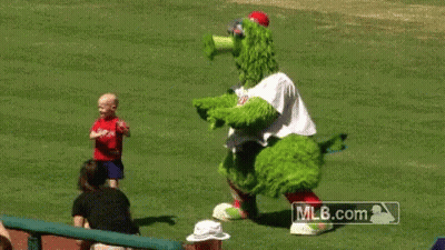 Little Girl And Phillies Mascot On Baseball Field GIF