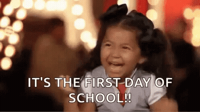 Little Girl Crying In Front Of First Day Of School Sign GIF