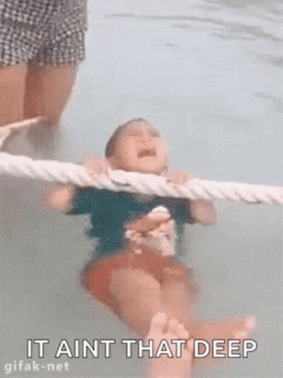 Little Girl Crying In Swimming Pool Held By Rope GIF