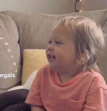Little Girl Crying On Couch GIF
