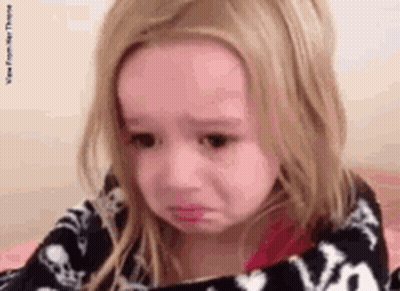 Little Girl Crying Wrapped In Blanket GIF