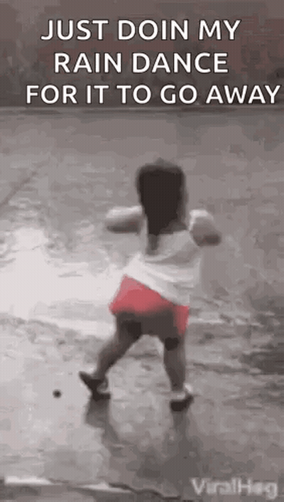 Little Girl Dancing in Rain