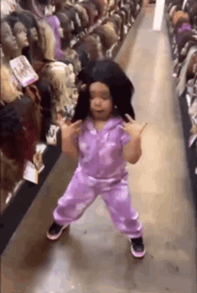 Little Girl Dancing With Wig GIF