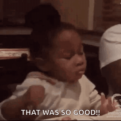 Little Girl Eating At Table GIF