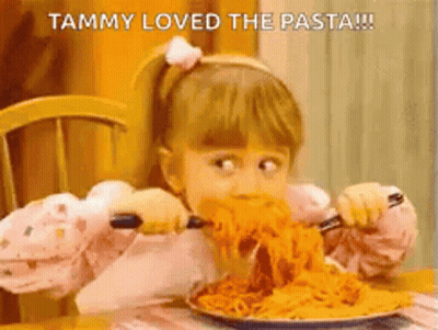 Little Girl Eating Spaghetti With Fork And Knife GIF