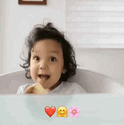 Little Girl Giving Thumbs Up In Bathtub GIF