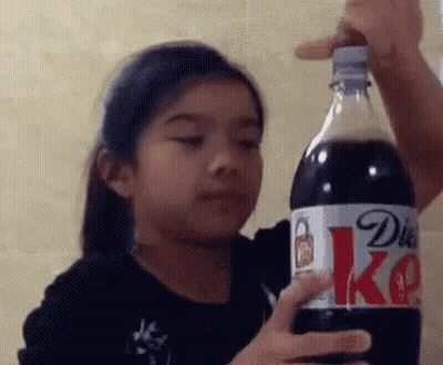 Little Girl Holding Diet Coke GIF