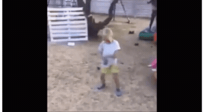 Little Girl Holding Sword In Sand Playground GIF