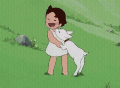 Little Girl Holding White Goat GIF