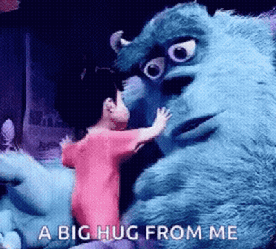 Little Girl Hugging Stuffed Animal From Monsters Inc GIF