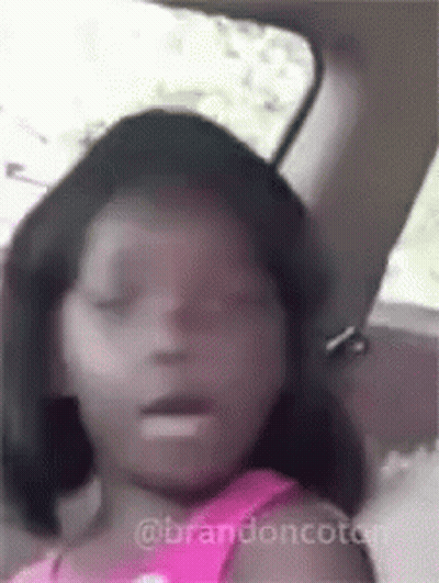 Little Girl In Back Seat Eyes Closed Mouth Open GIF