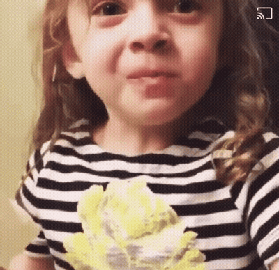 Little Girl In Black And White Striped Shirt Making A Face GIF