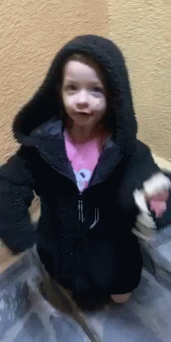 Little Girl In Black Jacket With Hood GIF