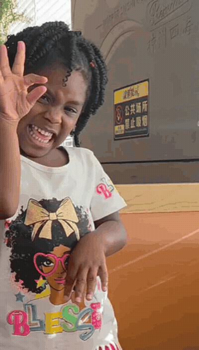 Little Girl In Blessed Shirt Giving OK Sign GIF