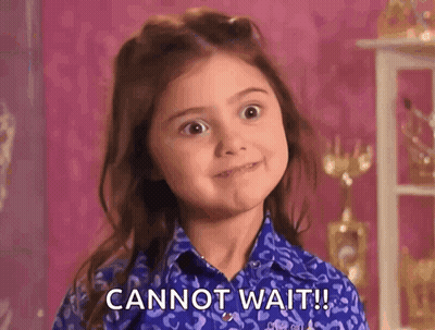 Little Girl In Blue Shirt Making Funny Face Saying Cannot Wait GIF