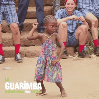 Little Girl In Dress Dancing At Guarimba Film Festival GIF