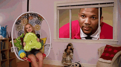 Little Girl In Hanging Chair Holding Letter A GIF