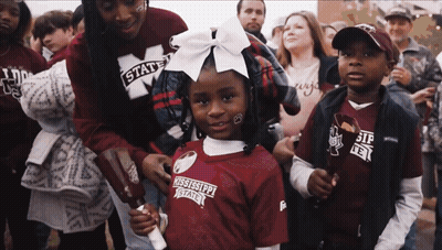 Little Girl In Mississippi State Jersey In Crowd GIF
