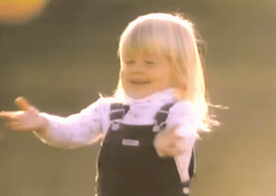 Little Girl In Overalls Smiling GIF