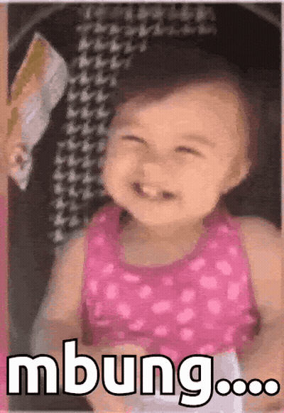 Little Girl In Pink Dress Dancing In Front Of TV GIF