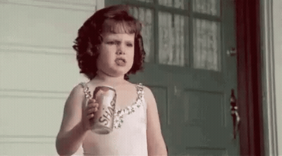 Little Girl In Pink Dress Holding Soda GIF