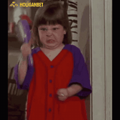 Little Girl In Red And Purple Shirt Making Funny Face GIF