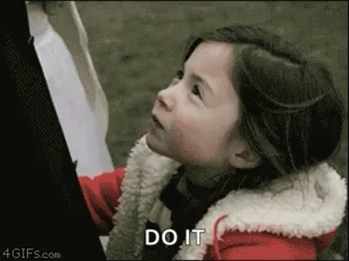 Little Girl In Red Jacket Saying Do It GIF