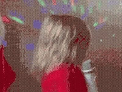 Little Girl In Red Sweater Holding Microphone GIF