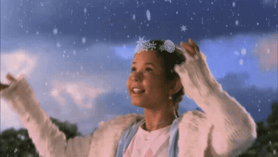 Little Girl In Snowflake Headband Looking Up GIF