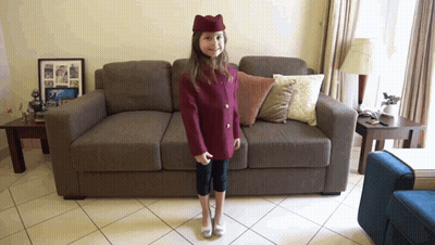 Little Girl In Stewardess Uniform GIF