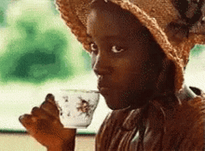 Little Girl In Straw Hat Drinking From White Cup GIF