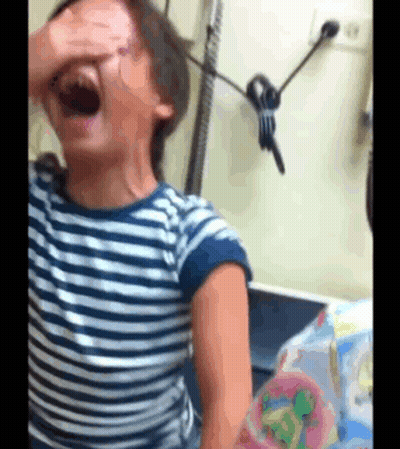 Little Girl In Striped Shirt Covering Eyes GIF