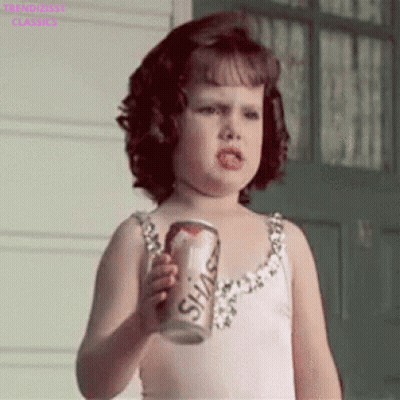 Little Girl In White Dress Holding Soda GIF