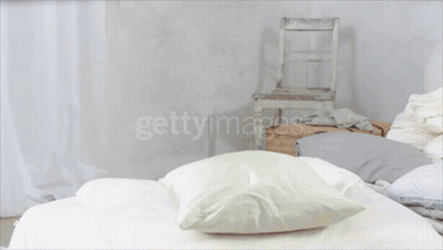 Little Girl Jumping With Pillow GIF